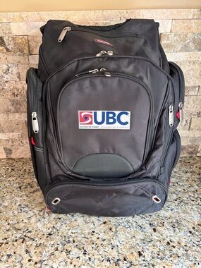 Black Men's elleven Backpack - Multi-Compartment Travel and Work Pack